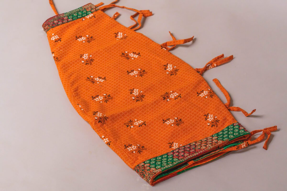 Orange Mridanga cover accessory for protecting your drum.