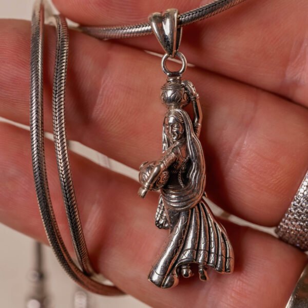 Adorn yourself with the divine love of Sri Radha with this pure 925 sterling silver pendant. A beautiful symbol of devotion and grace.