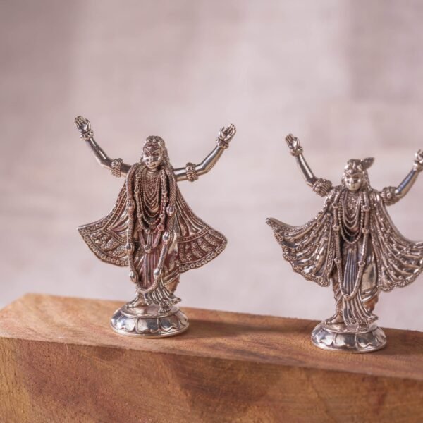 This exquisite 1.5-inch silver Gaura Nitay idol is a beautiful and cherished representation of Lord Chaitanya and Lord Nityananda Prabhu