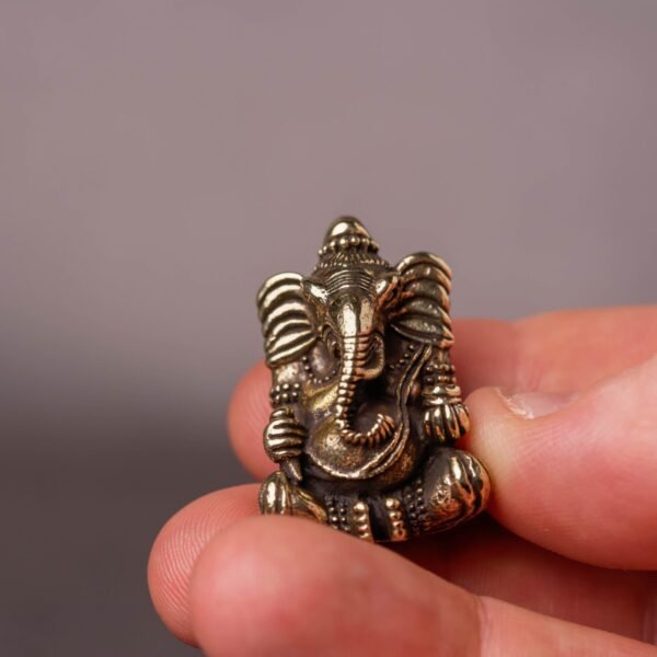 A Brass Murti of Lord Ganesha, 1.18 inches, is a truly miniature and highly versatile idol, perfect for devotional and decorative purposes.