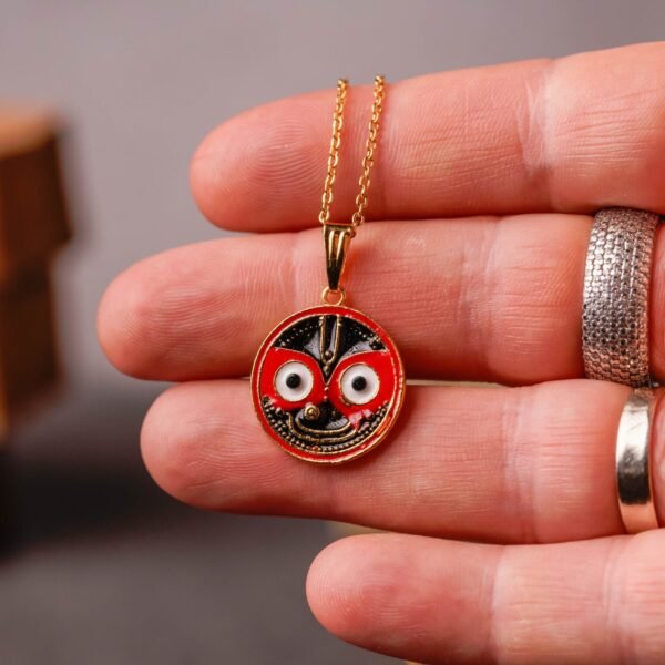 A Metal Jagannath Pendant with a Metal Chain is a beautiful and spiritually significant piece of devotional jewelry
