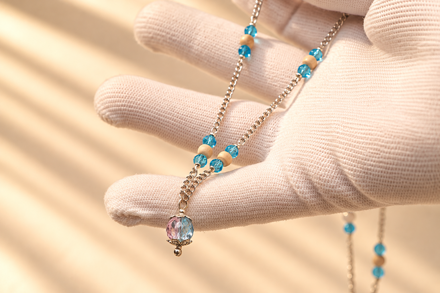 Gloved Hand with Turquoise Crystal Necklace